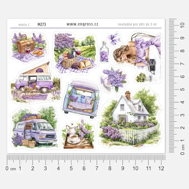 Arch samolepek s motivy cestování v karavanu.