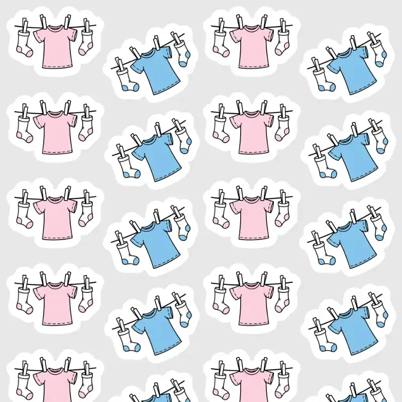 Samolepky pro plánování praní a sušení prádla v diáři v růžové a světle modré barvě.