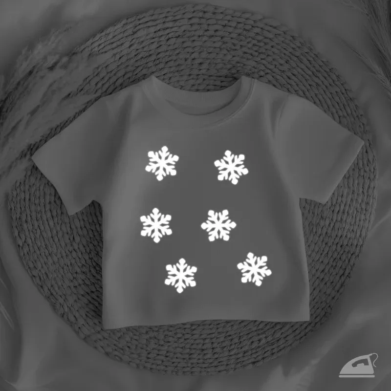 Reflexní nažehlovačky Vločka ke zvýšení viditelnosti při pohybu venku.