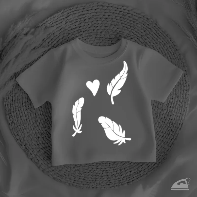 Reflexní nažehlovačky Ptačí pírka ke zvýšení viditelnosti při pohybu venku.