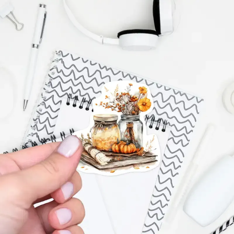 Samolepka s podzimní dekorací na diáři, kytice podzimních květů.